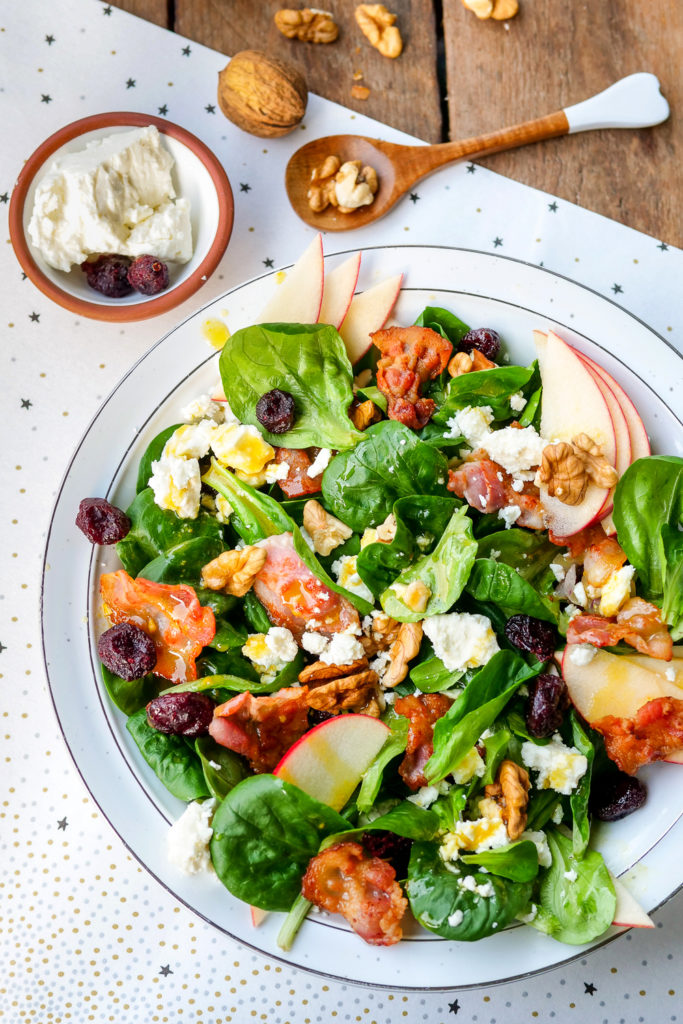  Corn salad with fried bacon, apples, cranberries, feta and walnuts - a fast and healthy winter salad 
